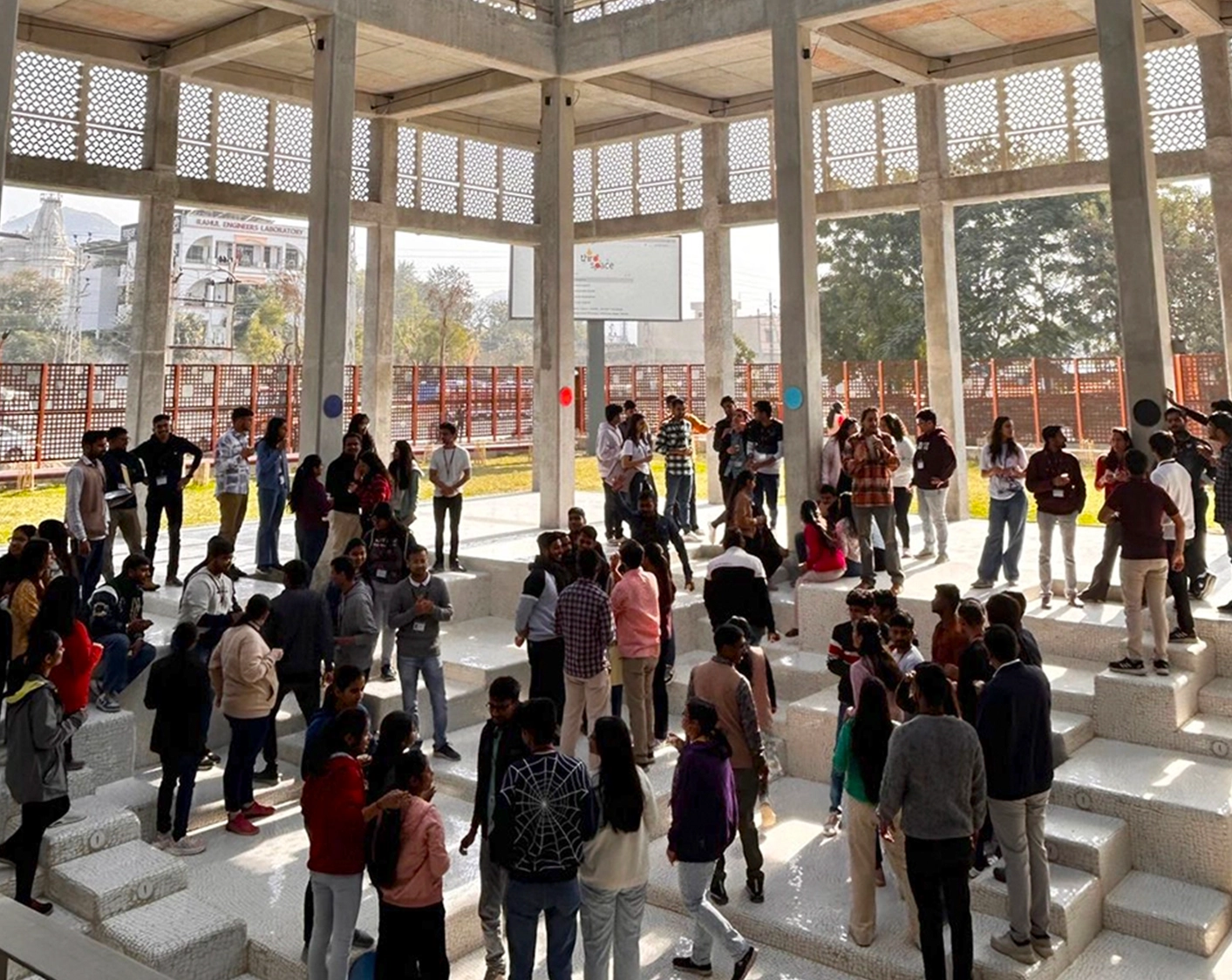 people sitting around table and discussing