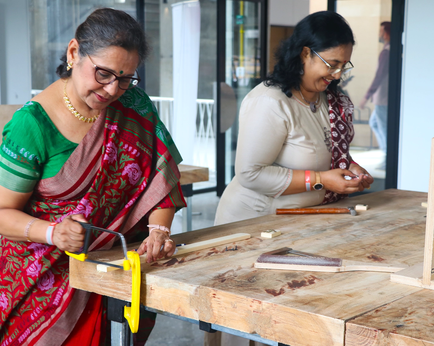 people sitting around table and discussing